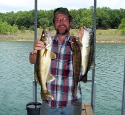 Al with a couple of dandy walleye and a nice bass